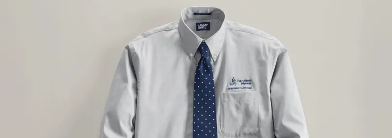 Lands' End custom embroidered corporate uniform dress shirt with company logo and tie.