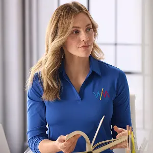 A woman wearing a blue collared top.