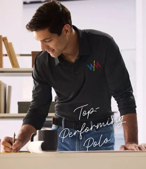 A man wearing a black, long sleeve polo.