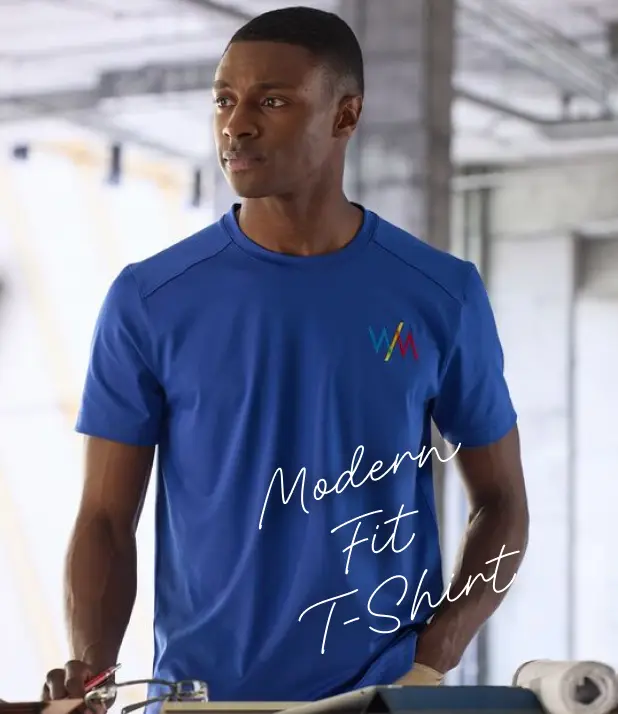 A man wearing a blue, modern fit t-shirt.