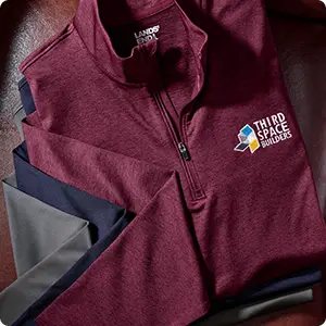 A burgundy quarter zip top.