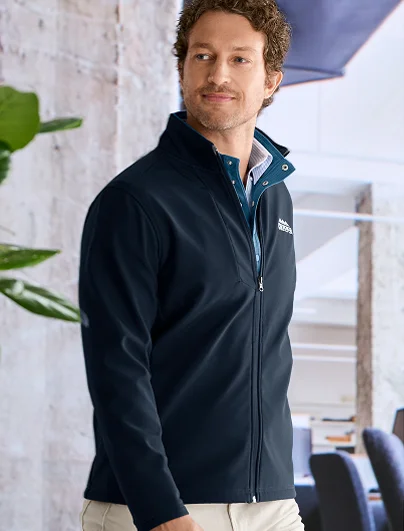 Man wearing a black soft shell jacket