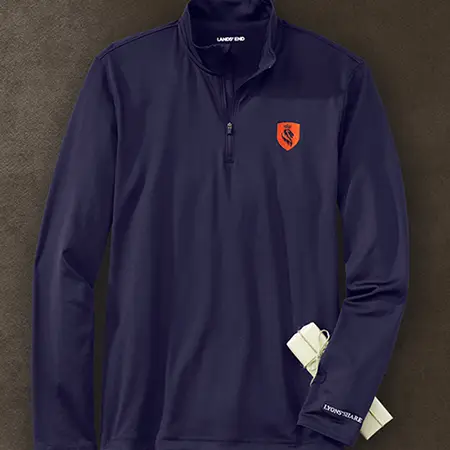 A navy quarter zip pullover jacket.