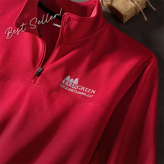 Best Seller! A red textured quarter zip sweater.