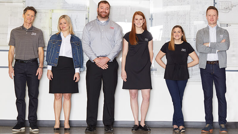A variety of people of different heights and body shapes.