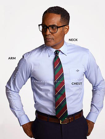 A man with dotted lines imposed on his outfit showing where to measure arm, chest and neck.