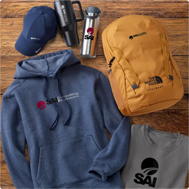 A laydown of promotional gear such as a hat, hoodie, backpack, t-shirt, and drinkware.